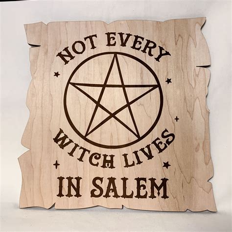 Elevate your Halloween decor with a witch themed wall sign by Ashland